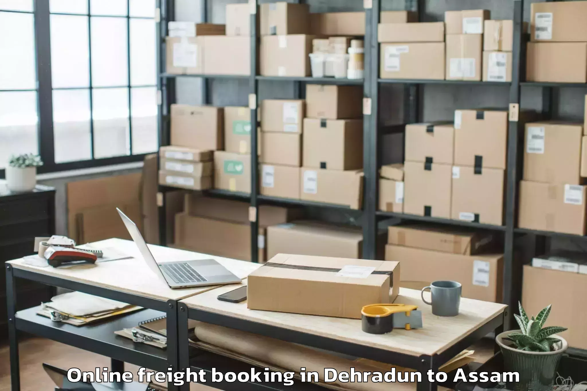 Trusted Dehradun to Marigaon Online Freight Booking